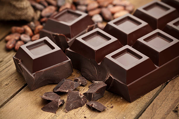 Dark Chocolate with Chunks on Wood Table